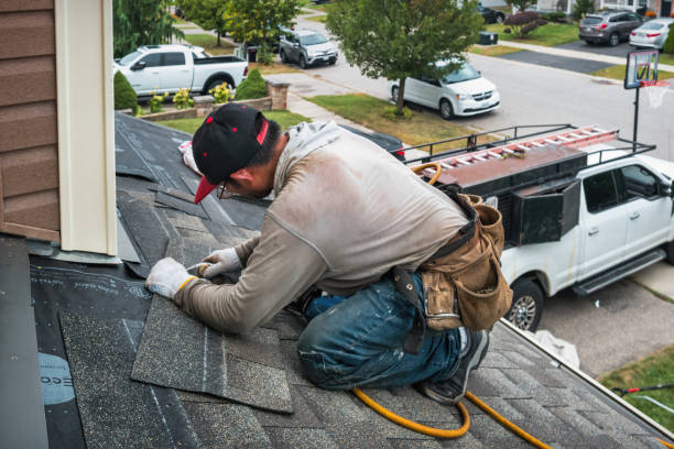 Professional Roofing technician working in Westford, MA